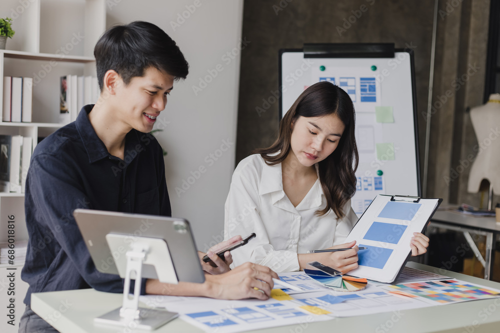 Business teamwork and working with UX developer and UI designer at table in modern office. Creative and development agency concept. Business teamwork and working with UX developer and UI designer at table in modern office. Creative and development agency concept.