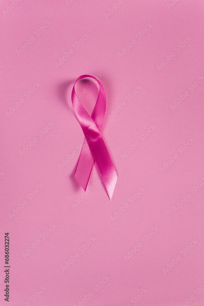 pink ribbon on a pink background, symbol of women suffering from breast cancer, support for women suffering from breast cancer pink ribbon on a pink background, symbol of women suffering from breast cancer, support for women suffering from breast cancer