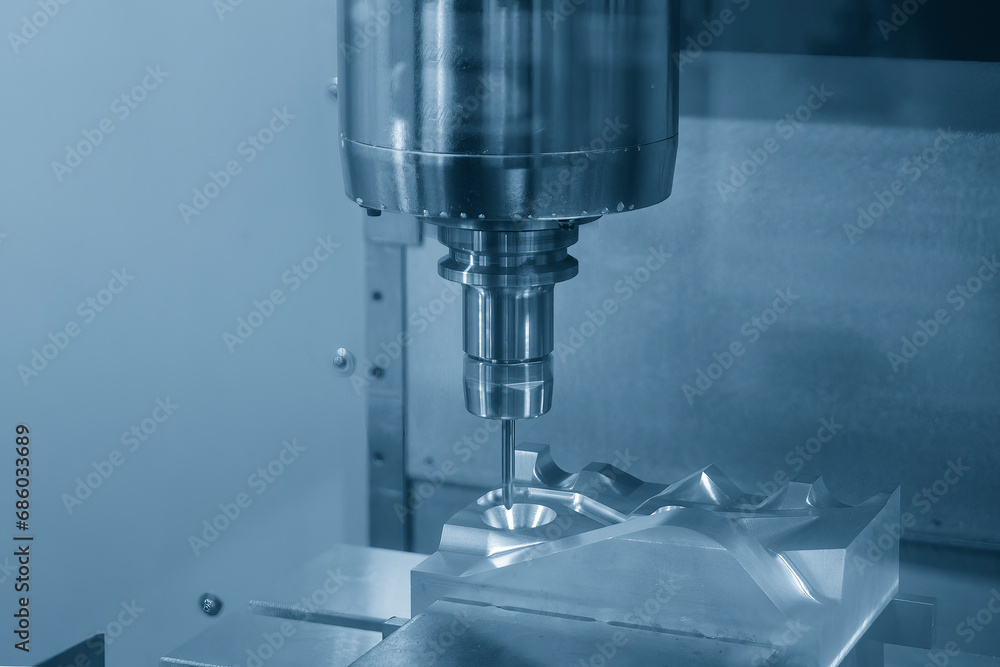 The CNC milling machine cutting mold part by solid ball end mill tool. The CNC milling machine cutting mold part by solid ball end mill tool.