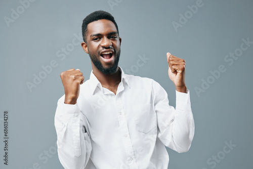 man standing african white shirt african copy studio space smile young american happy
