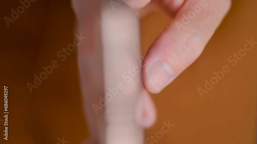 Wallpaper Mural Person swiping to the left in a smartphone app. Male hand doing a swipe in application Torontodigital.ca