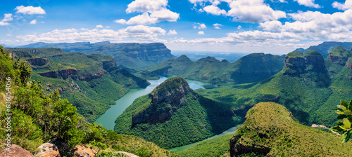 Panorama Route South Africa, Blyde river canyon with the three rondavels, impressive view of three rondavels and the Blyde river canyon in south Africa. photo