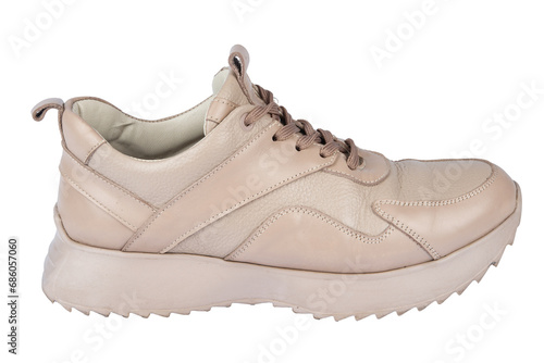 Stylish beige sneaker with shoelaces on white background