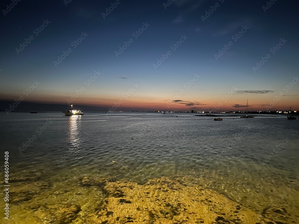 Fototapeta premium Mare e tramonto