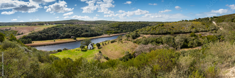 Naklejka premium still bay river valley a Mediterranean landscape of rolling hills and dry stone walls