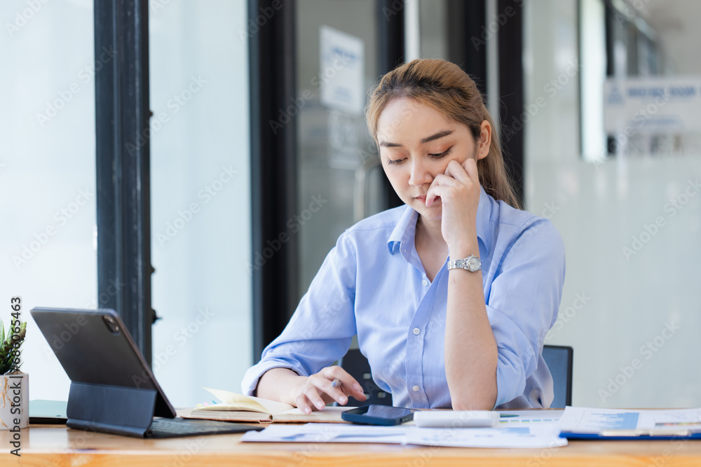 Young asian businesswoman stressed, Tired from work, Overthinking from working. Young asian businesswoman stressed, Tired from work, Overthinking from working.