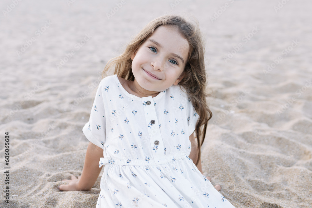 Little girl enjoying summer vacation at the sea Little girl enjoying summer vacation at the sea