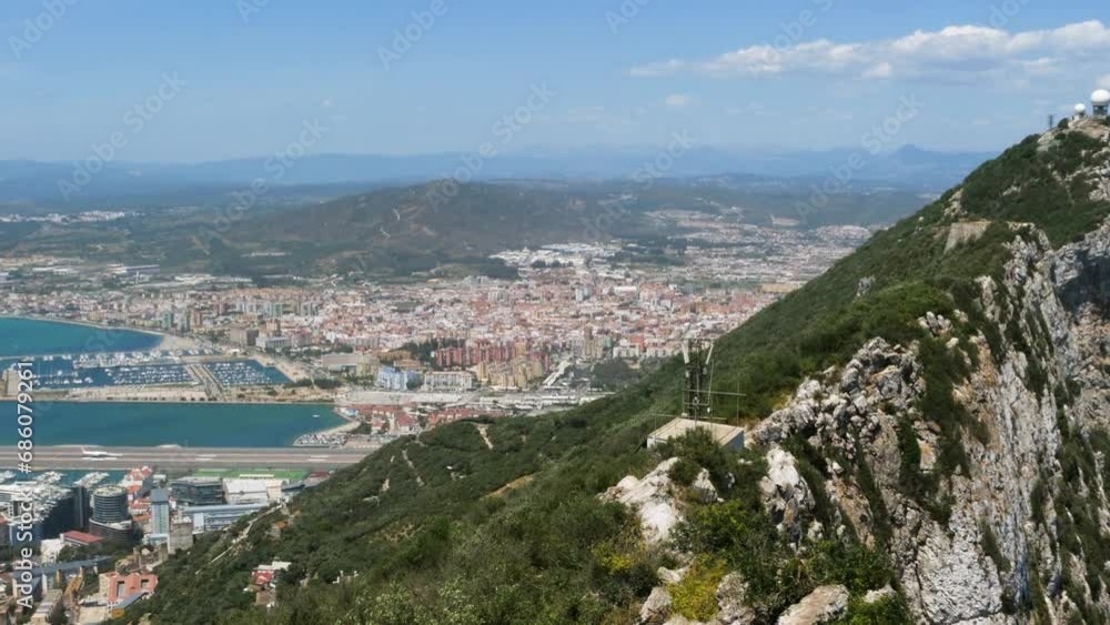 The Rock of Gibraltar. Town and airport in the background The Rock of Gibraltar. Town and airport in the background