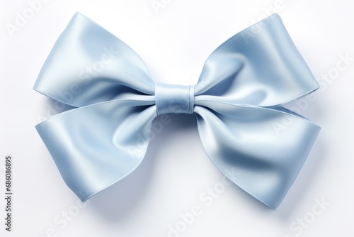 A blue bow on a white surface photo