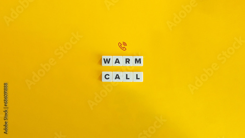 Warm Calling Business Jargon. Sales Call, Telemarketing Concept. Block Letter Tiles on Yellow Background. Minimalist Aesthetics. photo