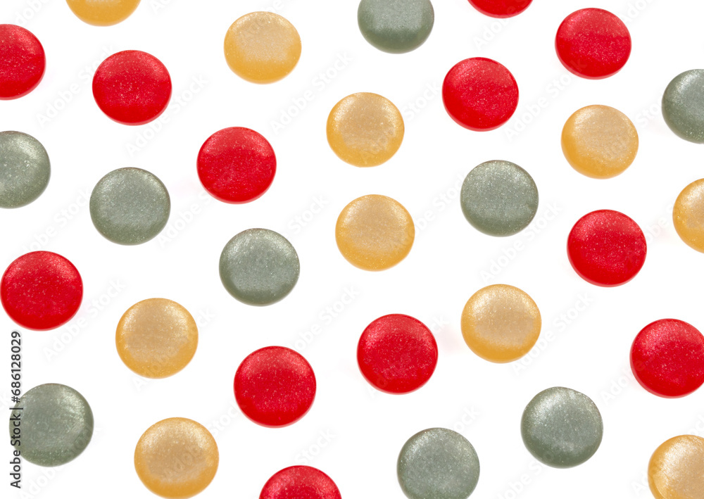 White background with plastic round multi-colored buttons White background with plastic round multi-colored buttons