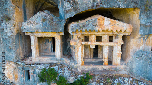Ancient Lycian rock tombs in Pinara ancient city, Fethiye - Turkiye.	 photo