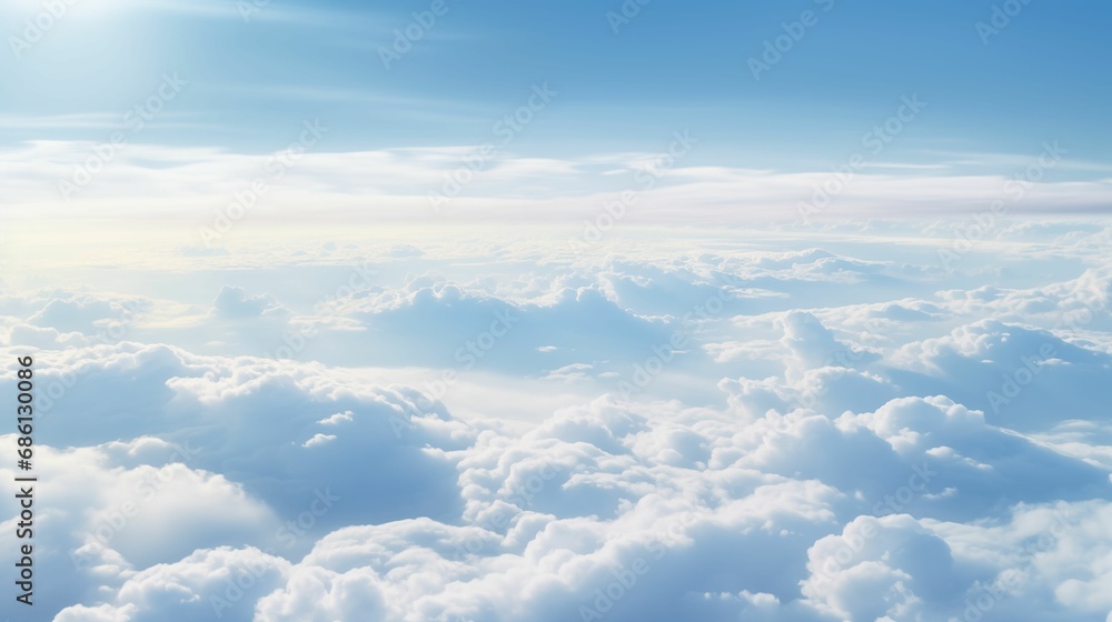 Image of clouds from an airplane window.