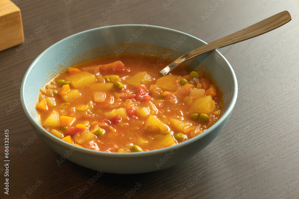 Homemade vegetable soup close up view of vegan healthy soup in a bowl Homemade vegetable soup close up view of vegan healthy soup in a bowl