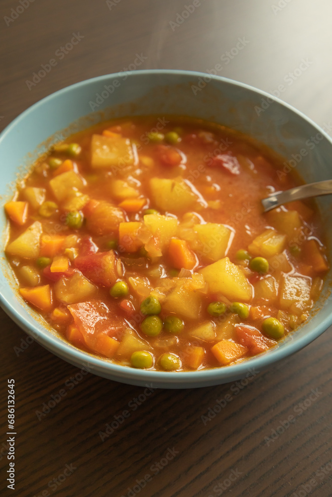 Homemade vegetable soup close up view of vegan healthy soup in a bowl Homemade vegetable soup close up view of vegan healthy soup in a bowl