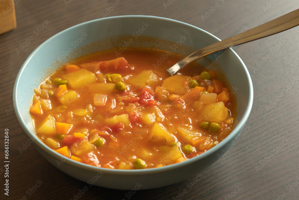 Homemade vegetable soup close up view of vegan healthy soup in a bowl Homemade vegetable soup close up view of vegan healthy soup in a bowl