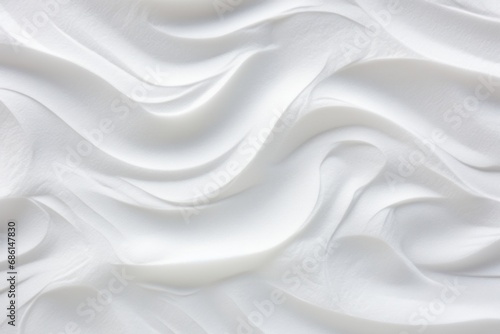 a close up of a white surface with a wavy design on the top of the surface and bottom of the surface.