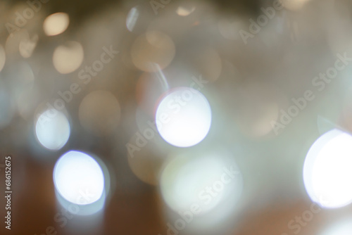 abstract white bokeh light background from Christmas decorative light © noppadon