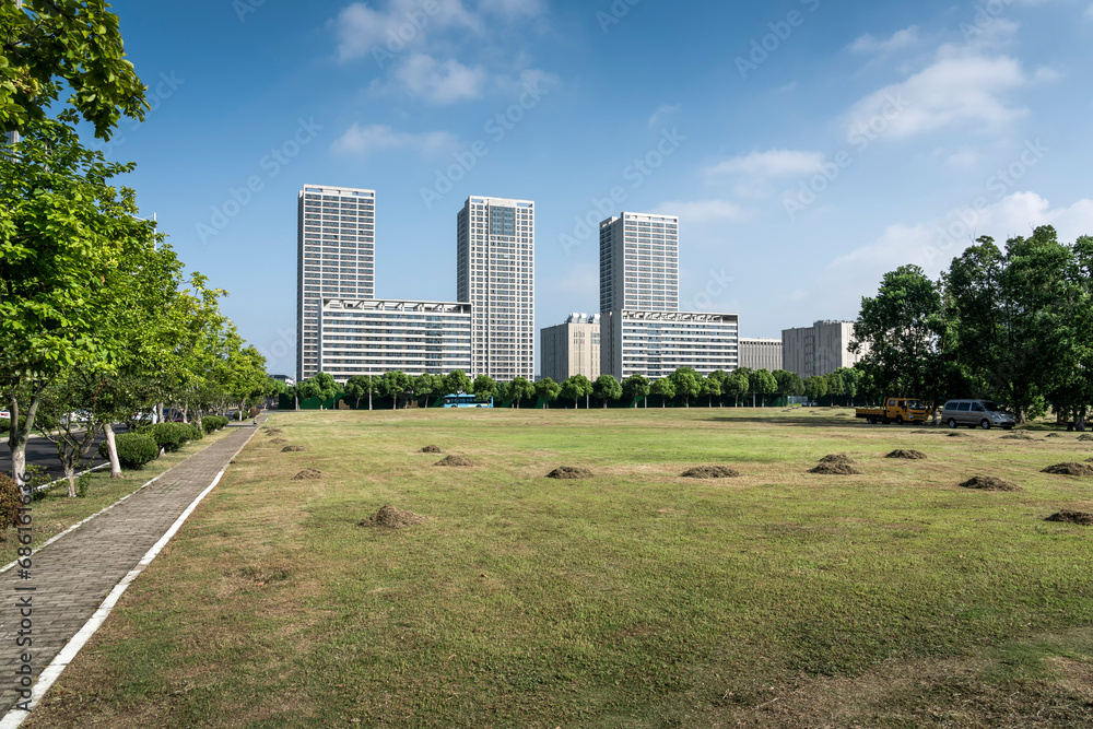 Green lawn in front of modern business building