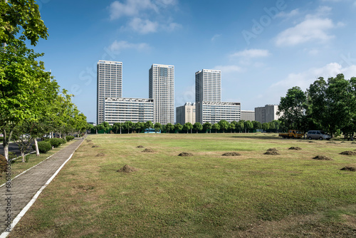 Green lawn in front of modern business building