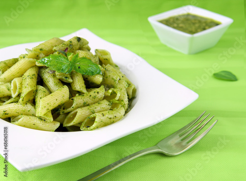 penne pasta with pesto and basil