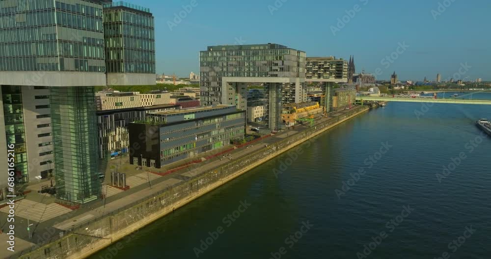 Aerial view of Rheinauhafen district in Cologne city, Germany. Former harbor area was redeveloped in urban regeneration project completed in 2011. Modern architecture of buildings Aerial view of Rheinauhafen district in Cologne city, Germany. Former harbor area was redeveloped in urban regeneration project completed in 2011. Modern architecture of buildings
