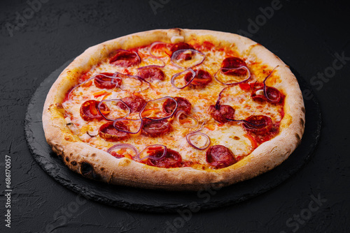 pizza with sausage and red onion