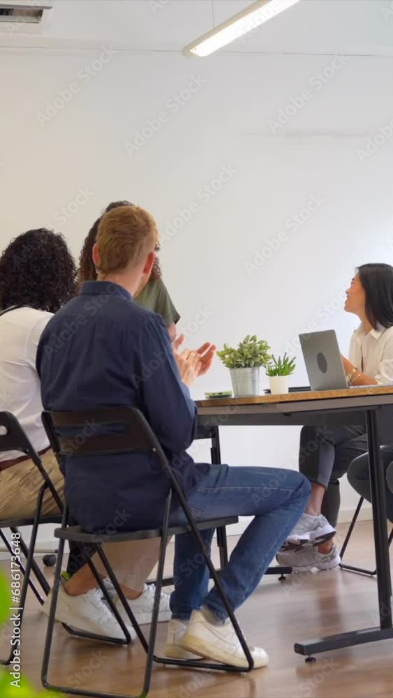 Good environment during a coworking meeting with young and multi-ethnic people Good environment during a coworking meeting with young and multi-ethnic people