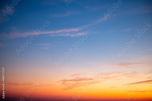 Beautiful of luxury soft gradient orange gold clouds and sunlight on the blue sky perfect for the background  take in everning Twilight