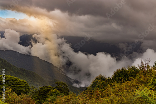 close up of the astonishing cloudscape.The surging,churning sea of cloud on the top of the green mountain,Jesus light and cloudy sky form a scenic scenery view.High quality photo,Hehuanshan,Taiwn. © 林智遠 