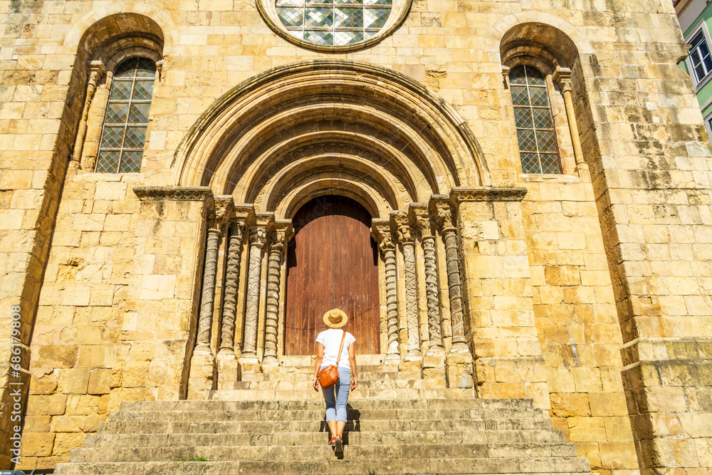 Woman visiting a church, Coimbra, Igreja de Sao Tiago