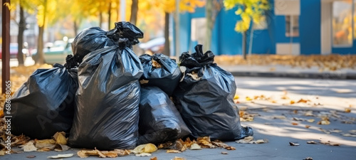 Fototapeta Naklejka Na Ścianę i Meble -  Overflowing garbage in parks for recycling, in autumn, social problems, Piling trash in the street, garbage crisis, Road and footpaths full of garbage Dirty street pollution trash