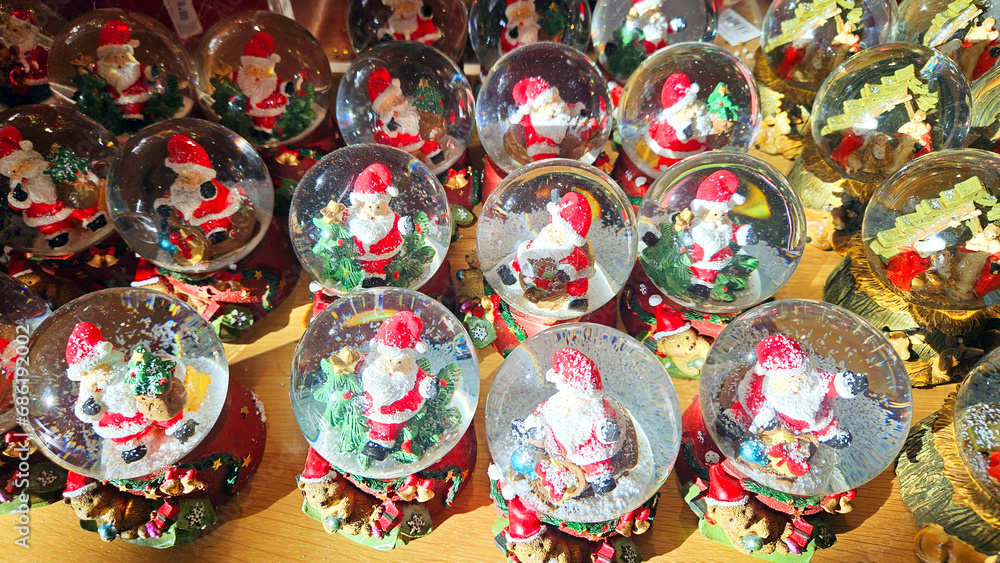 Christmas glass balls with snow and Santa Claus inside. waiting for Christmas
