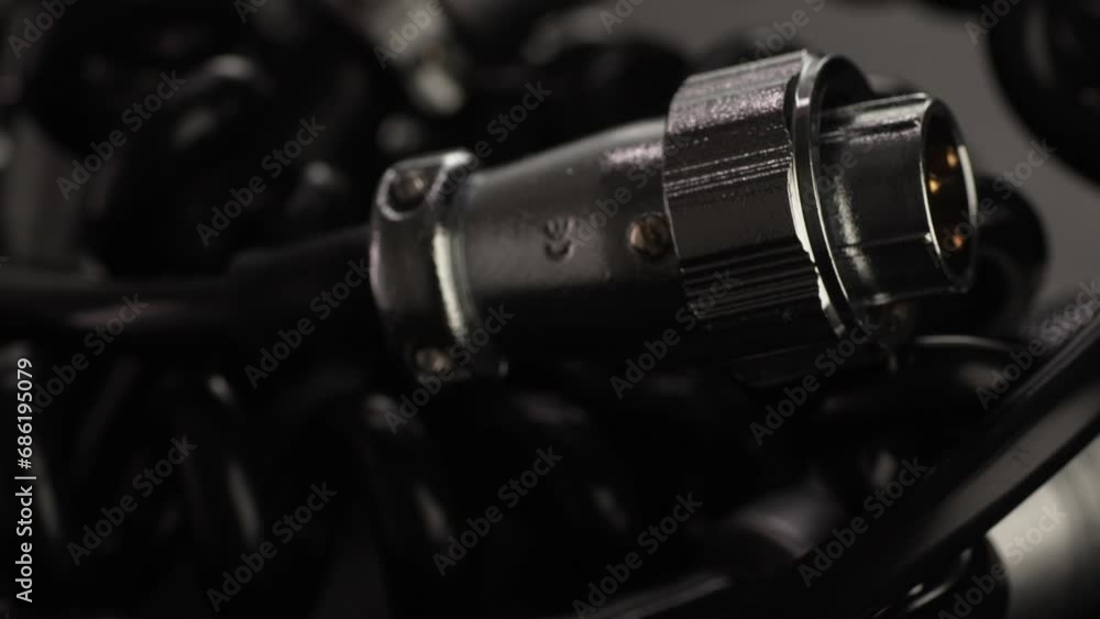 Rotating Power Cables and Connectors for Studio Equipment. Close-up, shallow dof.