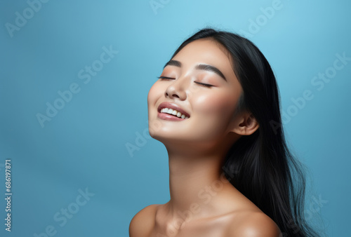 Asian, female and beauty portrait of a woman for skincare, health and cosmetics. Beauty, confident and attractive person with smooth healthy skin routine for glow, dermatology and hygiene in studio