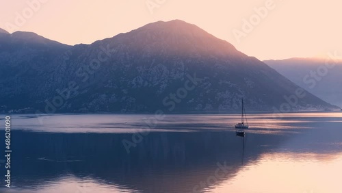 amazing boka kotorska view, water movement, reflection, autum velvet season in montenegro, balkans, adriatic coast, travel destination for relax and tranquility in nature, 
