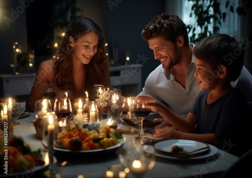 a family lights candles at a dinner table