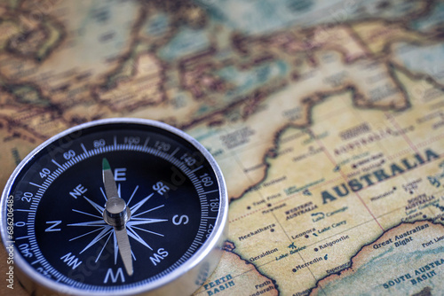 Compass on the background, old world map, vintage style, geo-navigation concept.