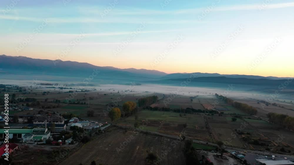 aerial view of foggy morning autumn mountains with clouds bansko bulgaria aerial view of foggy morning autumn mountains with clouds bansko bulgaria