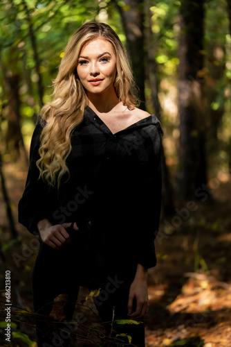 A Lovely Blonde Model Poses Outdoor While Enjoying The Fall Weather © Grindstone Media Grp