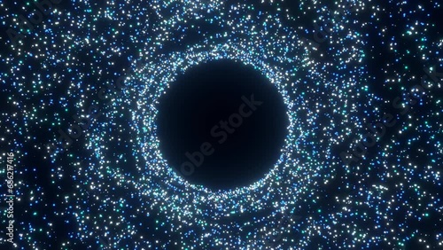 A spiral vortex of blue luminous particles followed by the formation of a black hole or portal. photo