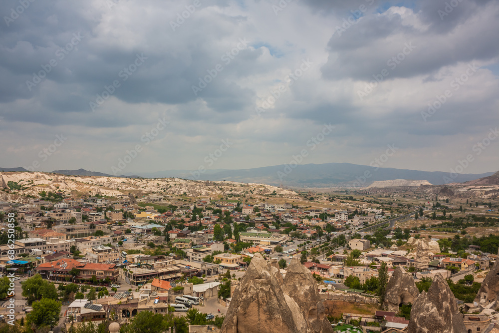 Fototapeta premium Rocky landscape in Cappadocia, Turkey. Travel in Cappadocia. Amazing landscape view of Goreme town in Cappadocia Turkey