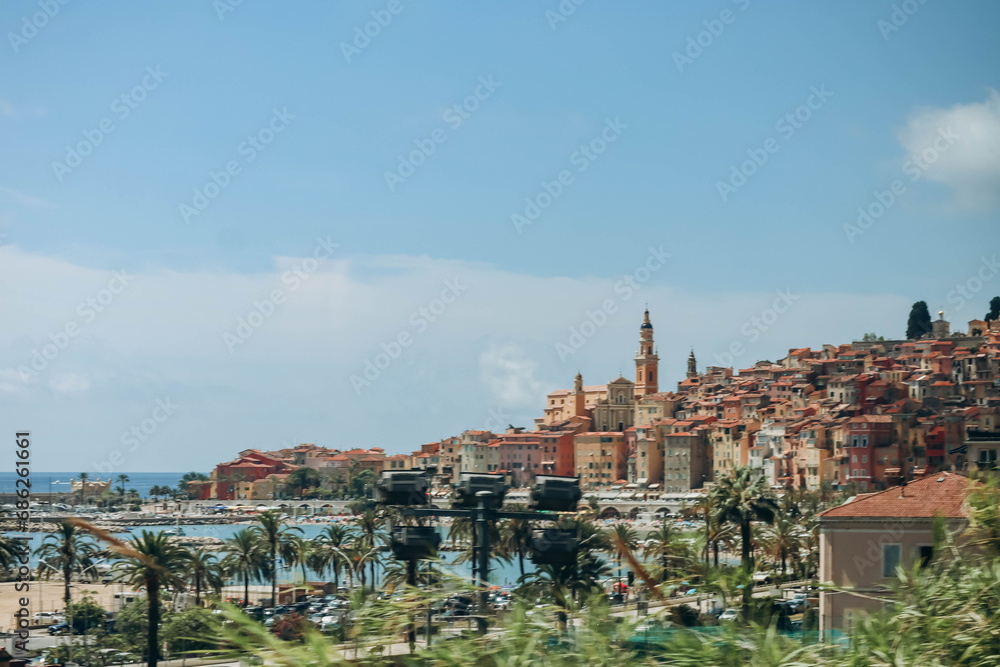 View of the facades of Menton from the train
