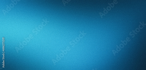 Blue gradient background grainy glowing blue light on dark backdrop noise texture effect banner header design photo