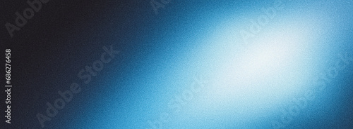 Blue gradient background grainy glowing blue light on dark backdrop noise texture effect banner header design photo