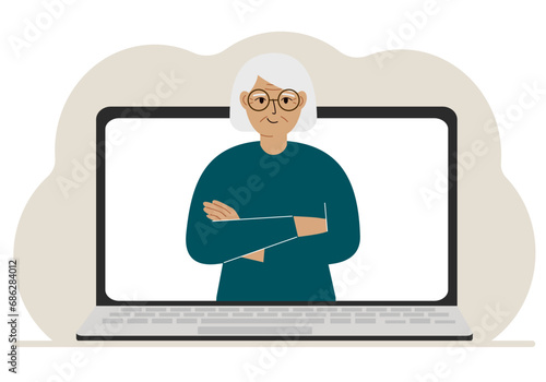 Woman communicates via videoconference through laptop screen. The concept of online meetings, webinars, remote work or work from home.