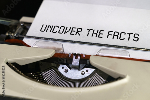 The text is printed on a typewriter - Uncover the Facts photo
