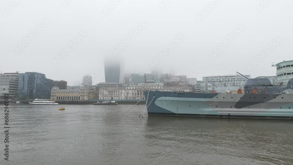 Buildings hidden in the fog in Central London across the river. Buildings hidden in the fog in Central London across the river.
