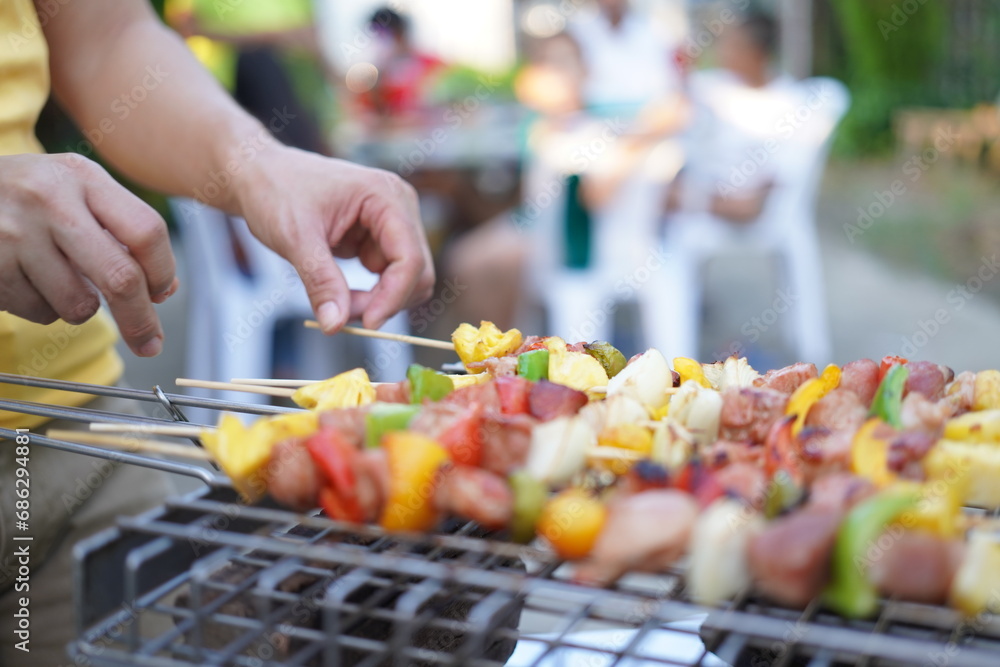 Asian, American and African family parties with grilled seafood and beer drinks, BBQ