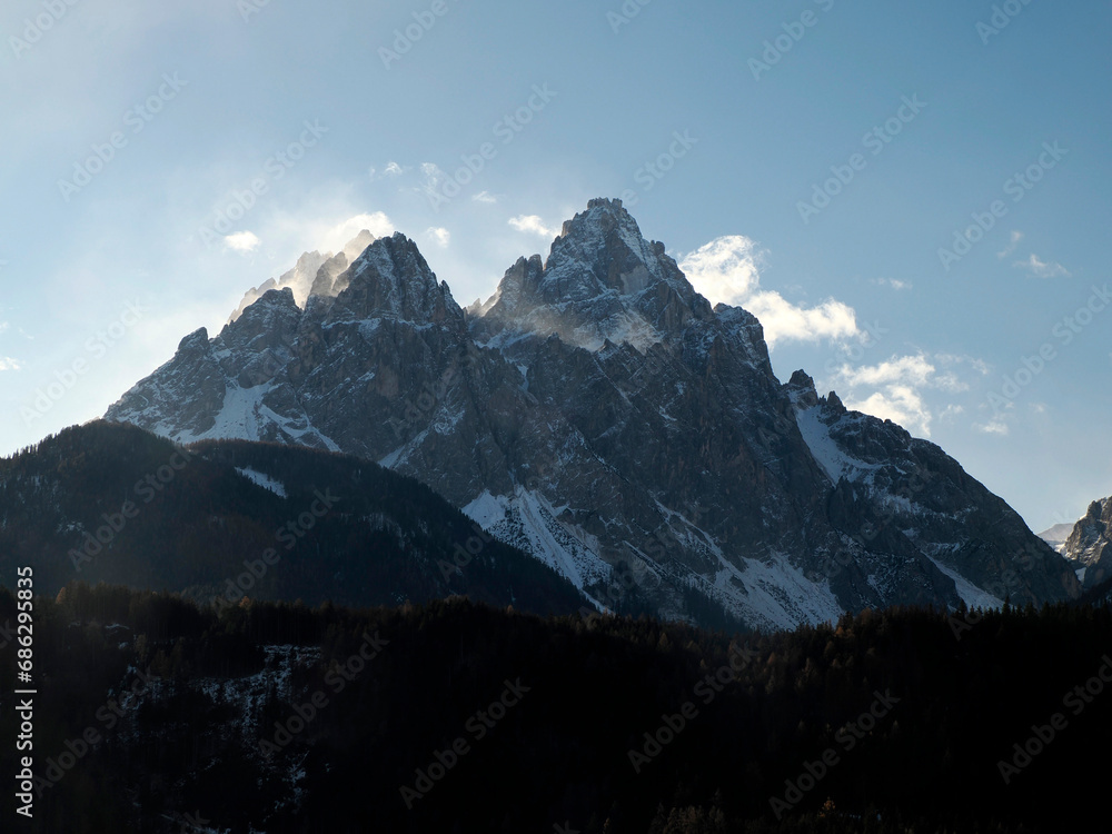 Windy day on Dolomites park of Lavaredo Peaks of Mountain Rudo, Croda dei Rondoi, Torre dei Scarperi, Croda dei Baranci, Cima Piatta Alta, Tre Cime di Lavaredo, view from Versciaco Dobbiaco
